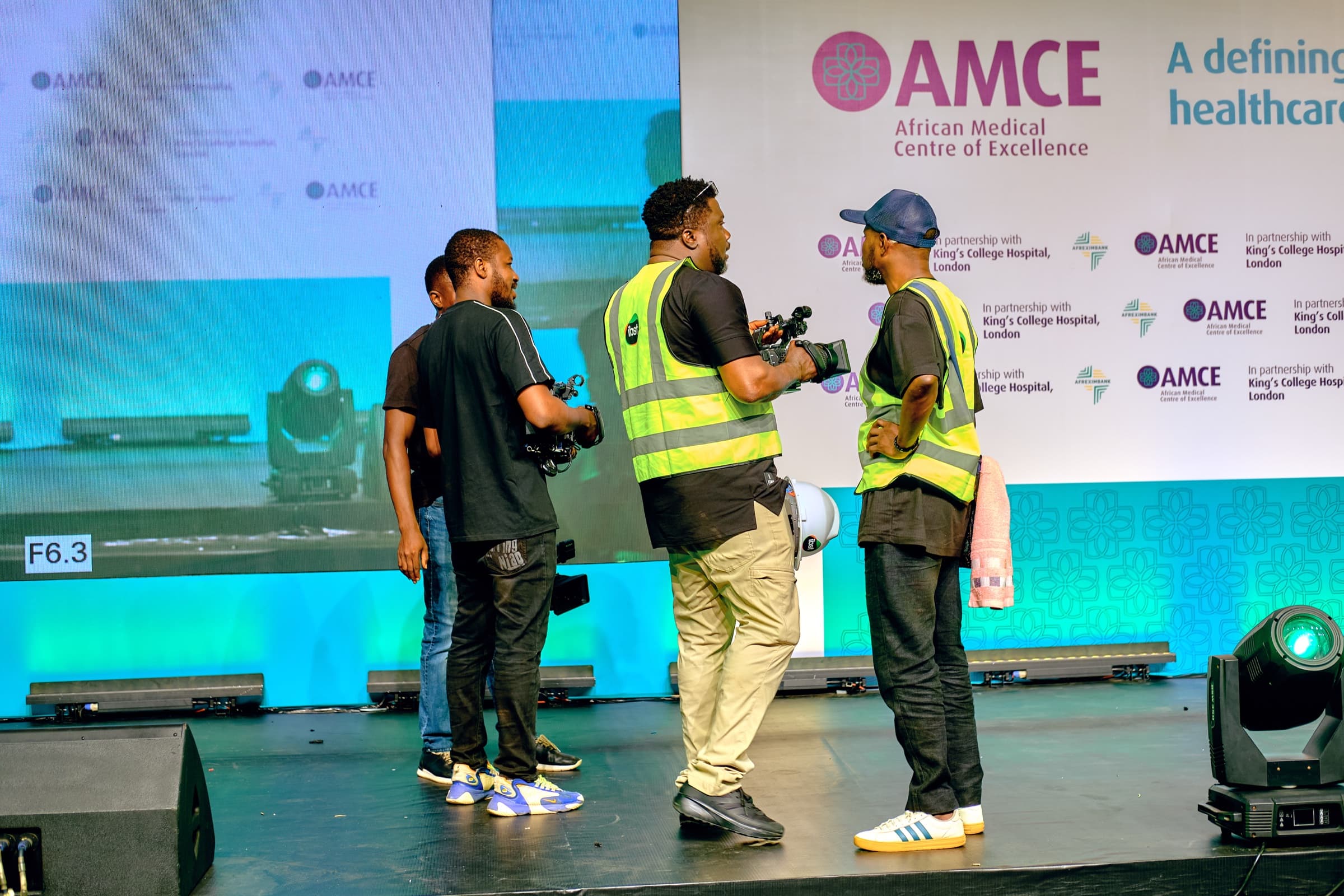 IBST Media documentary production team preparing camera equipment at AMCE